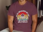 A man wearing a burgundy t-shirt with a humorous golf-themed graphic and text about searching for golf balls.