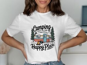 Woman wearing a white t-shirt with "Camping is my Happy Place" graphic featuring a retro camper and trees.