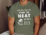 Man wearing a light green t-shirt with the text "If You Can't Stand the HEAT get me a BEER" and a beer mug graphic.