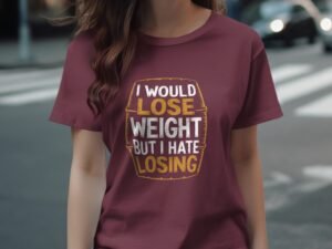 A woman in a maroon t-shirt with the text "I would lose weight but I hate losing" walks on a city street.