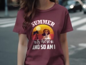 A woman in a maroon t-shirt with a summer-themed graphic featuring sunglasses, palm trees, and a sunset.