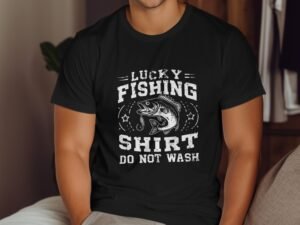 A man wearing a black t-shirt with the text "Lucky Fishing Shirt Do Not Wash" and a fish graphic.