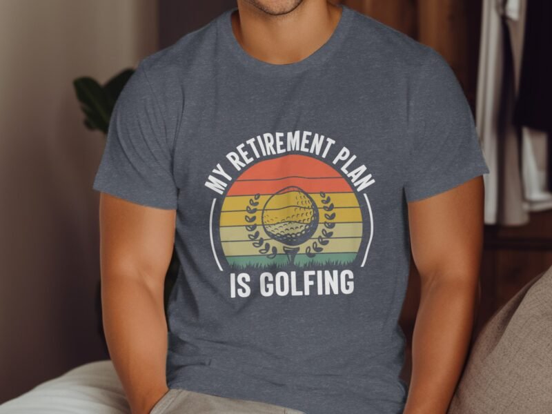 Man wearing a charcoal gray t-shirt with the text "MY RETIREMENT PLAN IS GOLFING" and a graphic of a golf ball.