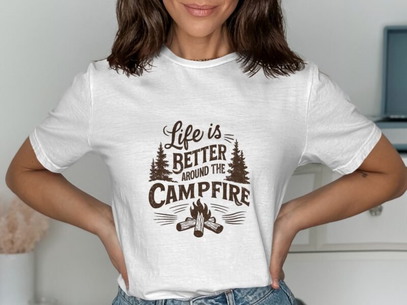 A person in a white t-shirt with "Life is better around the campfire" graphic, standing against a light background.