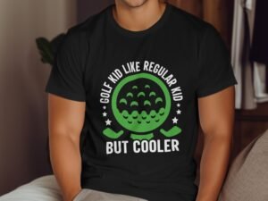 A person wearing a black t-shirt with green and white text: "GOLF KID LIKE REGULAR KID BUT COOLER" around a golf graphic.