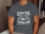 A man wearing a dark gray t-shirt with the text "Camping Solves Most Problems Beer Solves the Rest," featuring mountains and trees.