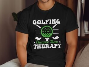 A person wearing a black t-shirt with the slogan "Golfing Cheaper Than Therapy" and a graphic of a golf ball.
