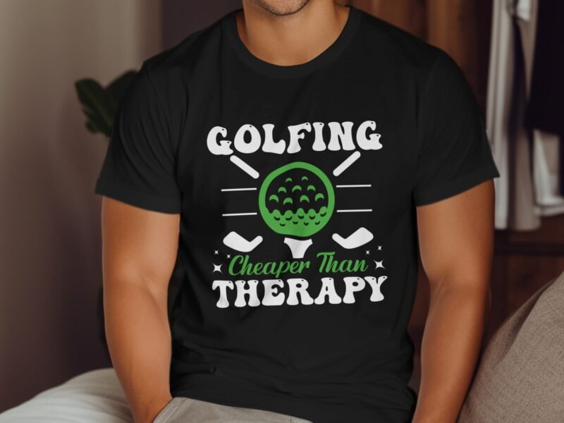 A person wearing a black t-shirt with the slogan "Golfing Cheaper Than Therapy" and a graphic of a golf ball.