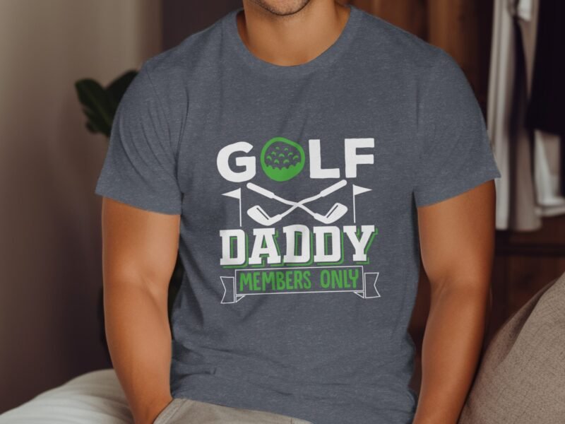 Man wearing a gray T-shirt with "GOLF DADDY MEMBERS ONLY" graphic and crossed golf clubs design.