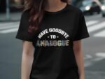 A woman wearing a black t-shirt with "WAVE GOODBYE TO ANALOGUE" printed in colorful letters.