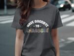 A woman wears a dark gray t-shirt with the text "WAVE GOODBYE TO ANALOGUE" featuring colorful wave designs.