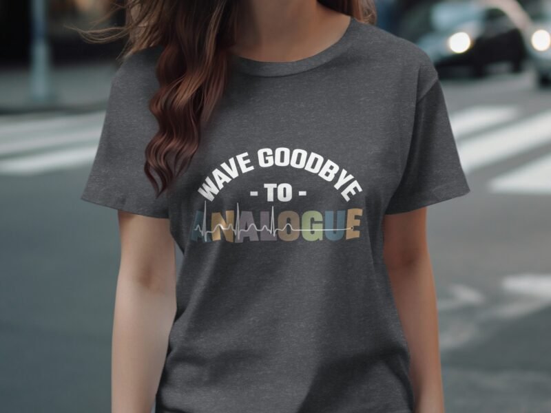 A woman wears a dark gray t-shirt with the text "WAVE GOODBYE TO ANALOGUE" featuring colorful wave designs.