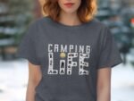 A woman in a gray t-shirt displays the text "CAMPING LIFE" decorated with camping icons in various colors.