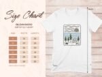 Size chart for Gildan 64000 softstyle t-shirt with dimensions listed and a nature-themed graphic on the shirt.