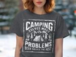 Woman wearing a dark gray t-shirt featuring a camping-themed graphic and text about solving problems with camping and beer.