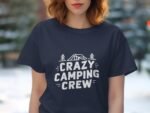 Woman wearing a navy t-shirt with the text "CRAZY CAMPING CREW" and graphics of a tent and trees.