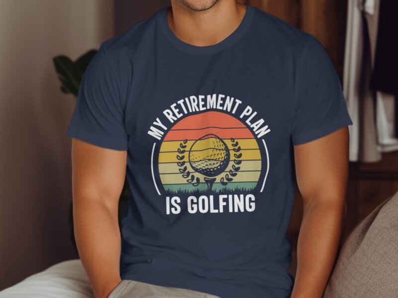A man wearing a navy t-shirt with the text 'MY RETIREMENT PLAN IS GOLFING' and a graphic of a golf ball.