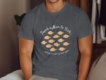 Man wearing a gray t-shirt with the phrase "Teach a Man to Fish..." surrounded by colorful fish illustrations.