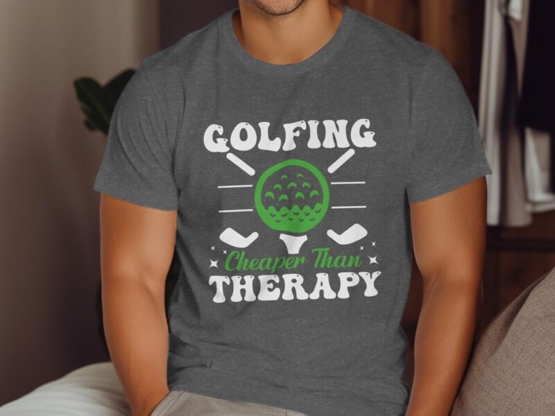 A man wearing a gray T-shirt with the text "GOLFING Cheaper Than THERAPY" and a graphic of a golf ball and clubs.
