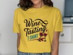A person in a yellow t-shirt featuring "Wine Tasting" text and wine glasses graphic stands in a casual setting.