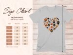 Size chart for Gildan 64000 softstyle t-shirt with heart-shaped Halloween graphics on a light gray shirt.