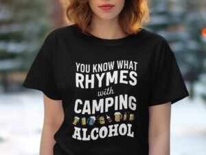 Woman in a black t-shirt with the text, “You know what rhymes with camping? Alcohol,” surrounded by snow.