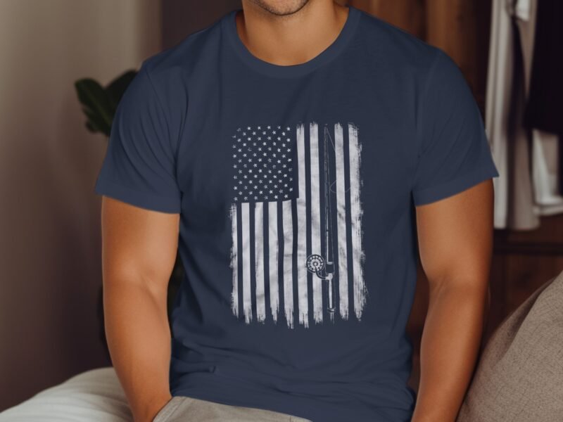 A man wearing a navy blue t-shirt featuring a distressed American flag design with a spiral symbol.