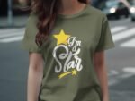 A person wearing an olive green t-shirt with the text "I'm a Star" and a yellow star graphic.