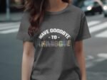 Person wearing a gray t-shirt with the phrase "WAVE GOODBYE TO ANALOGUE" in colorful text and sound wave graphics.