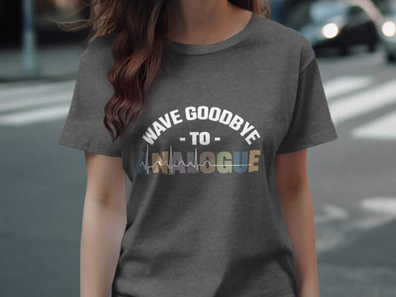 Person wearing a gray t-shirt with the phrase "WAVE GOODBYE TO ANALOGUE" in colorful text and sound wave graphics.