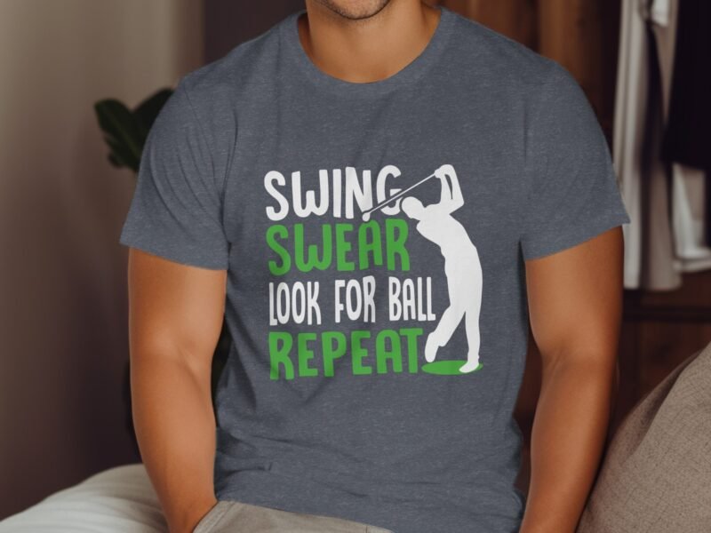 Gray t-shirt with text: "SWING SWEAR LOOK FOR BALL REPEAT" and a golfer silhouette.